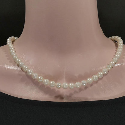 Akoya real pearl necklace with 6.0-6.5mm pearls and 42cm (16.5 in) length displayed on white background