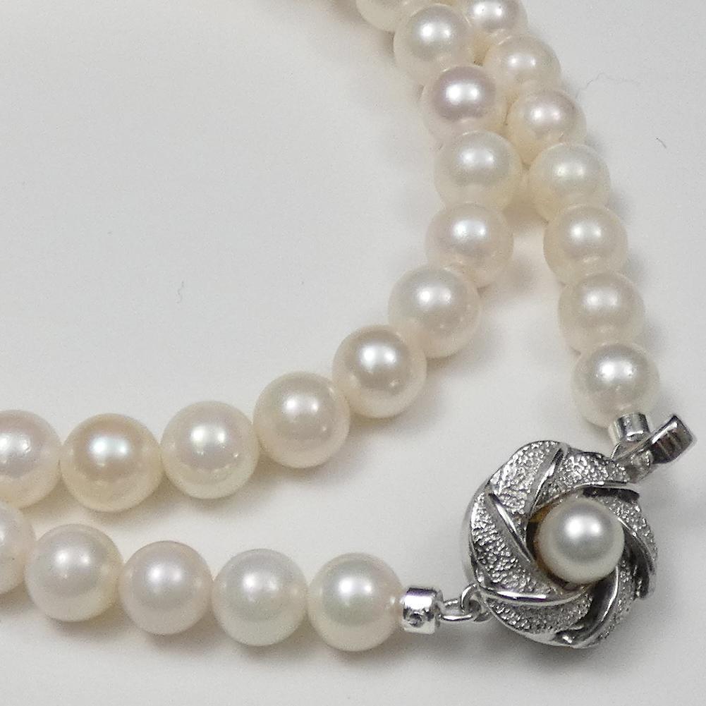 Akoya real pearl necklace with 6.0-6.5mm pearls and 42cm (16.5 in) length displayed on white background