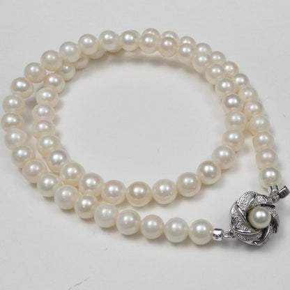 Akoya real pearl necklace with 6.0-6.5mm pearls and 42cm (16.5 in) length displayed on white background
