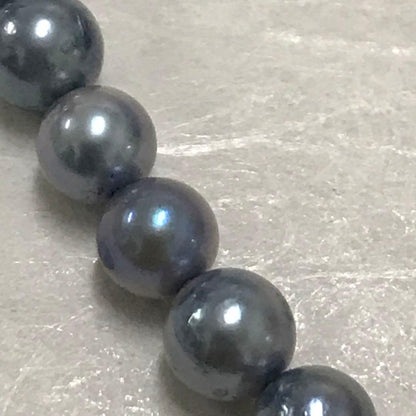 Akoya pearl necklace with small round blue-grey pearls on a 40cm strand with sterling silver clasp
