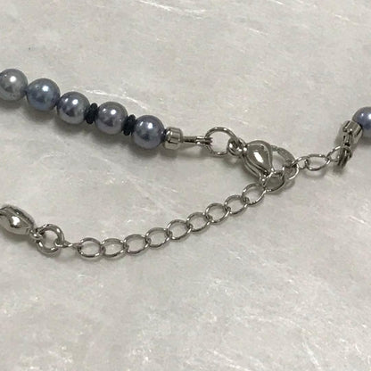 Akoya pearl necklace with small round blue-grey pearls on a 40cm strand with sterling silver clasp