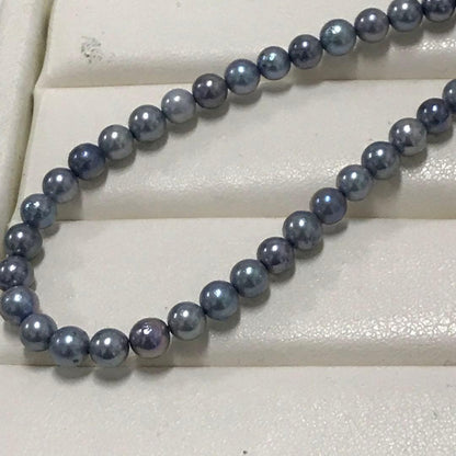 Akoya pearl necklace with small round blue-grey pearls on a 40cm strand with sterling silver clasp