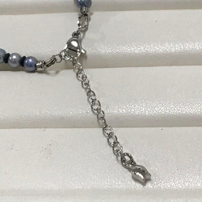 Akoya pearl necklace with small round blue-grey pearls on a 40cm strand with sterling silver clasp