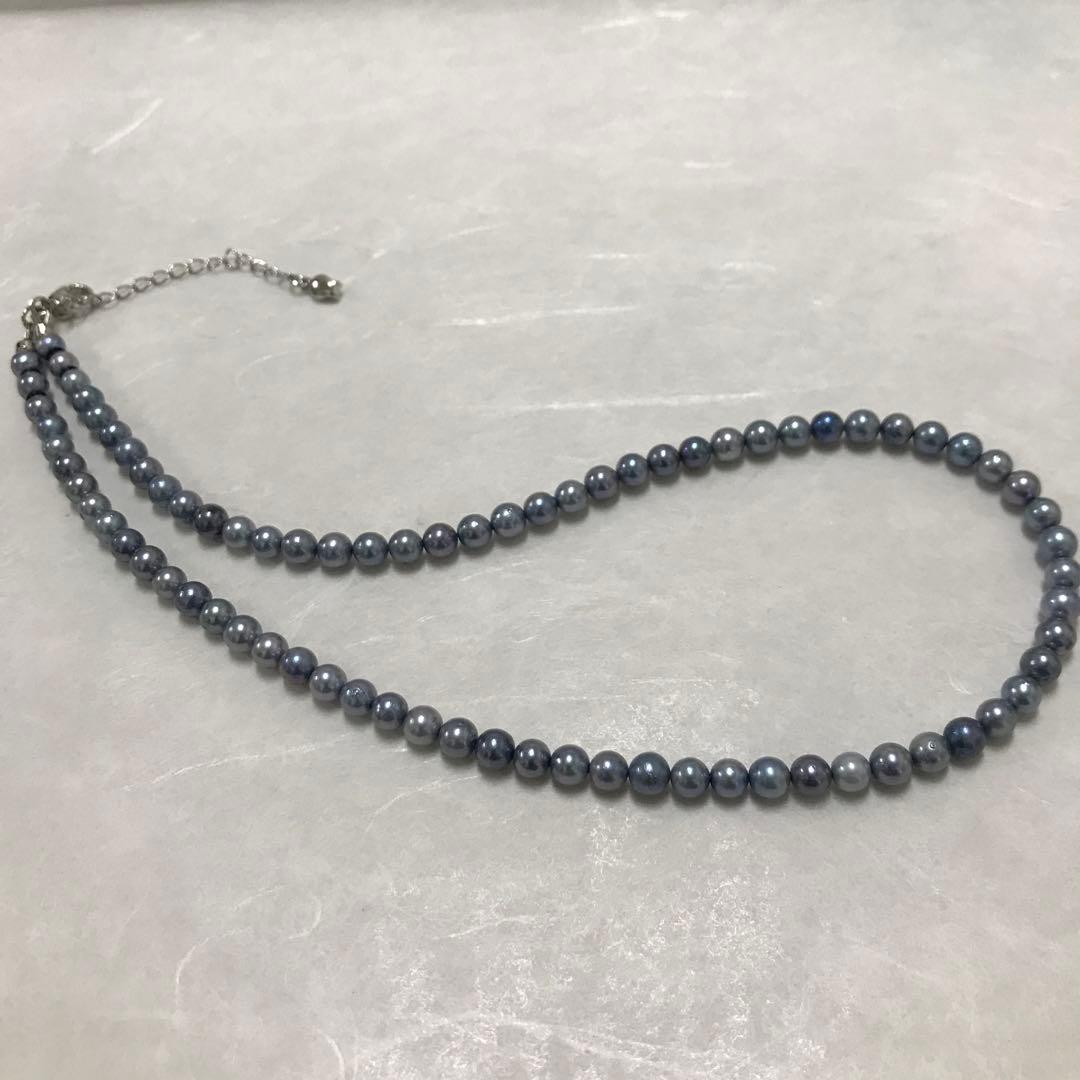 Akoya pearl necklace with small round blue-grey pearls on a 40cm strand with sterling silver clasp