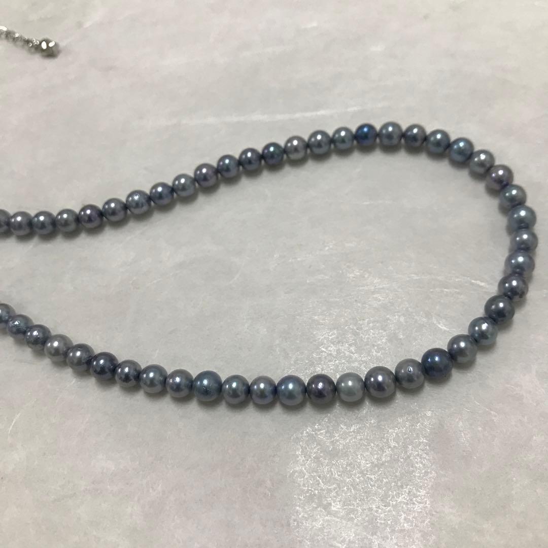 Akoya pearl necklace with small round blue-grey pearls on a 40cm strand with sterling silver clasp