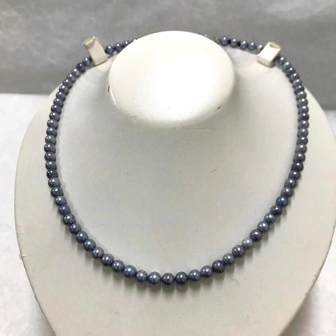 Akoya pearl necklace with small round blue-grey pearls on a 40cm strand with sterling silver clasp