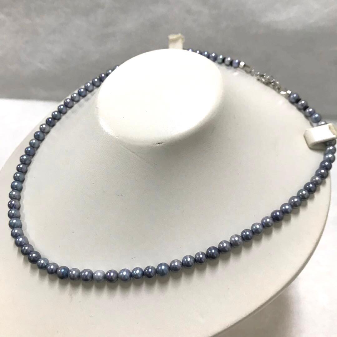 Akoya pearl necklace with small round blue-grey pearls on a 40cm strand with sterling silver clasp