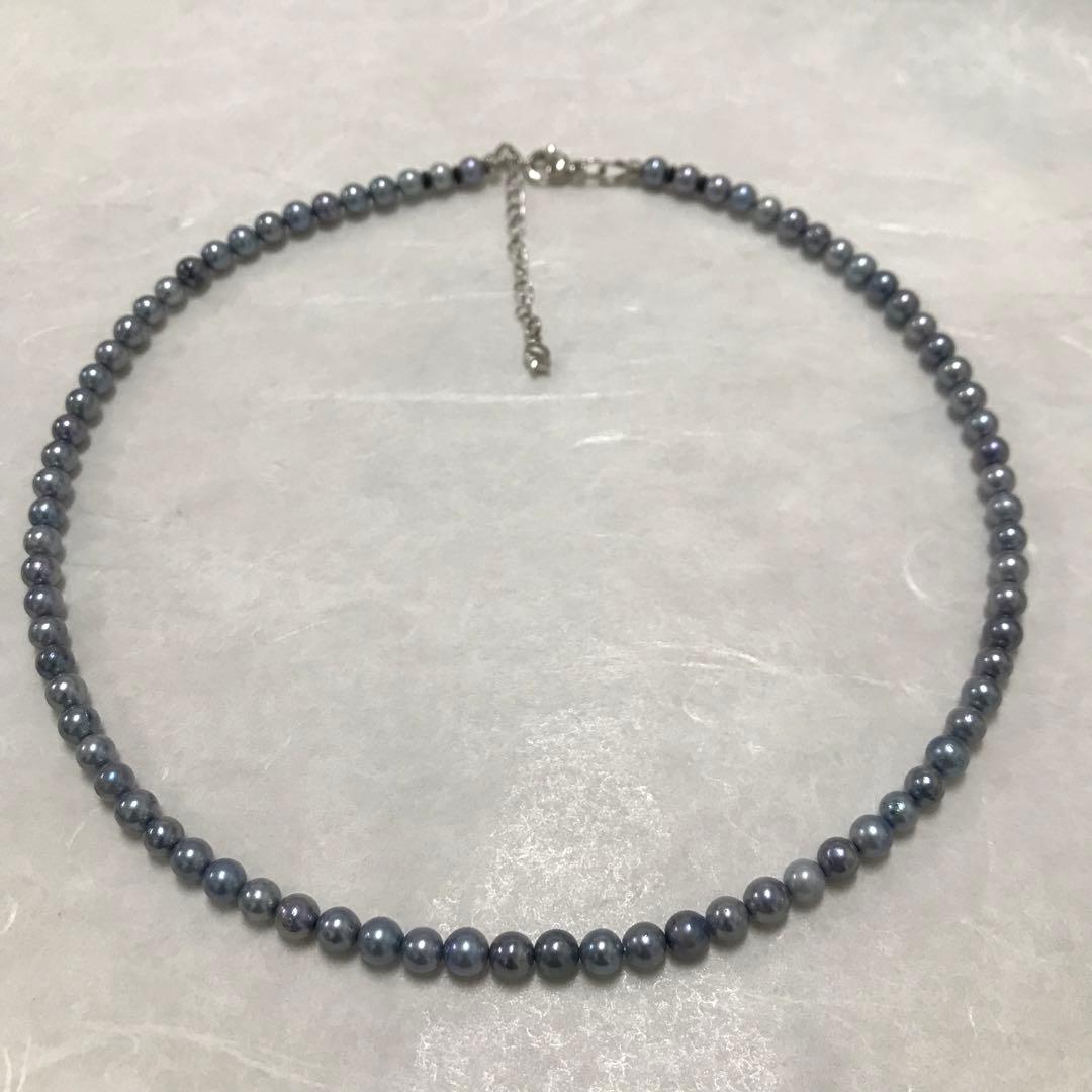 Akoya pearl necklace with small round blue-grey pearls on a 40cm strand with sterling silver clasp