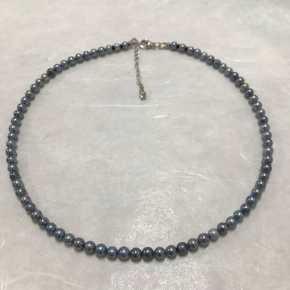 Akoya pearl necklace with small round blue-grey pearls on a 40cm strand with sterling silver clasp
