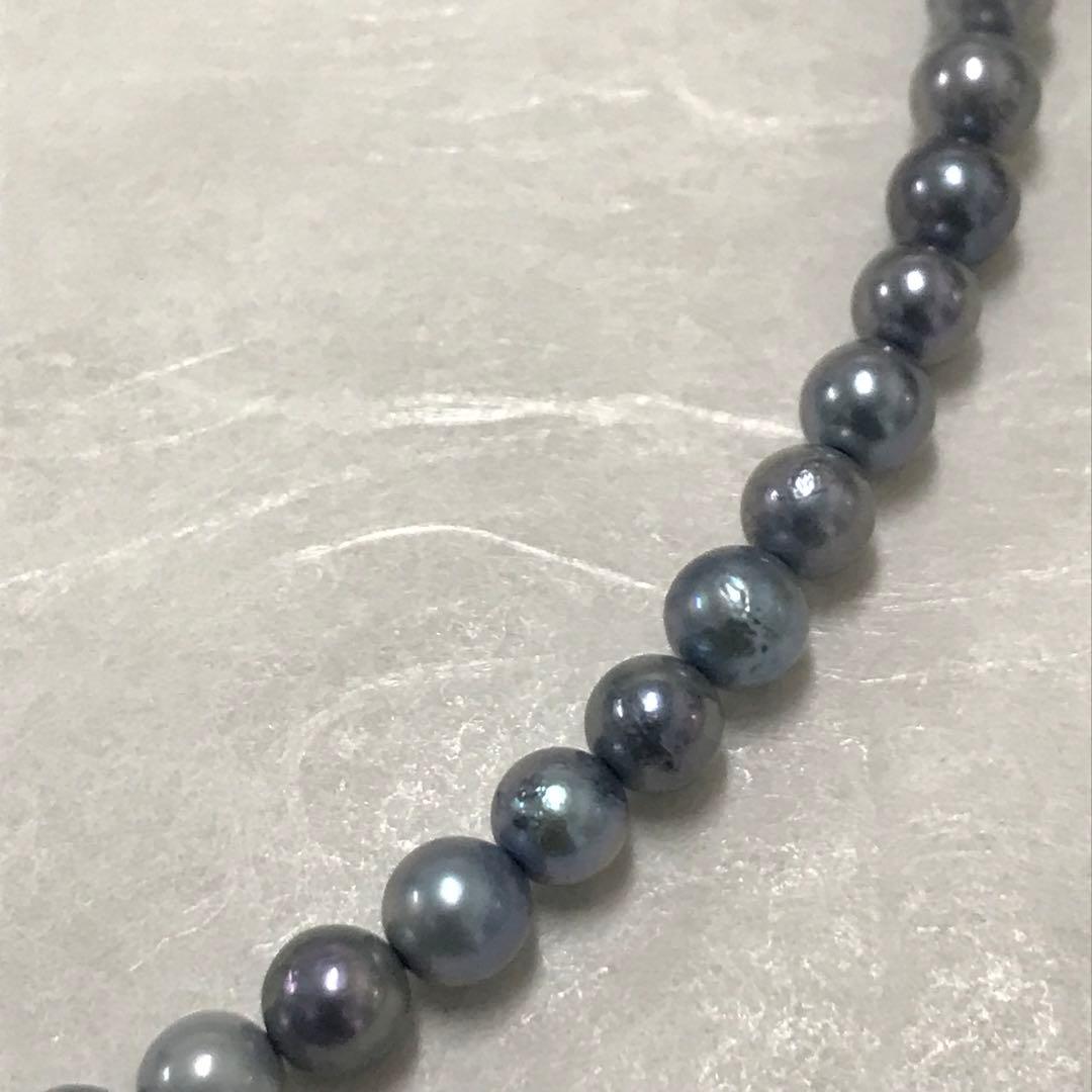 Akoya pearl necklace with small round blue-grey pearls on a 40cm strand with sterling silver clasp