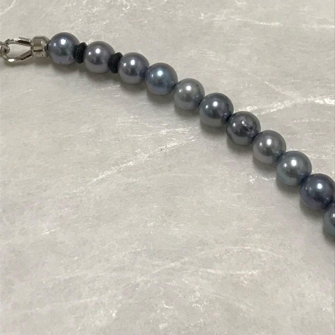 Akoya pearl necklace with small round blue-grey pearls on a 40cm strand with sterling silver clasp