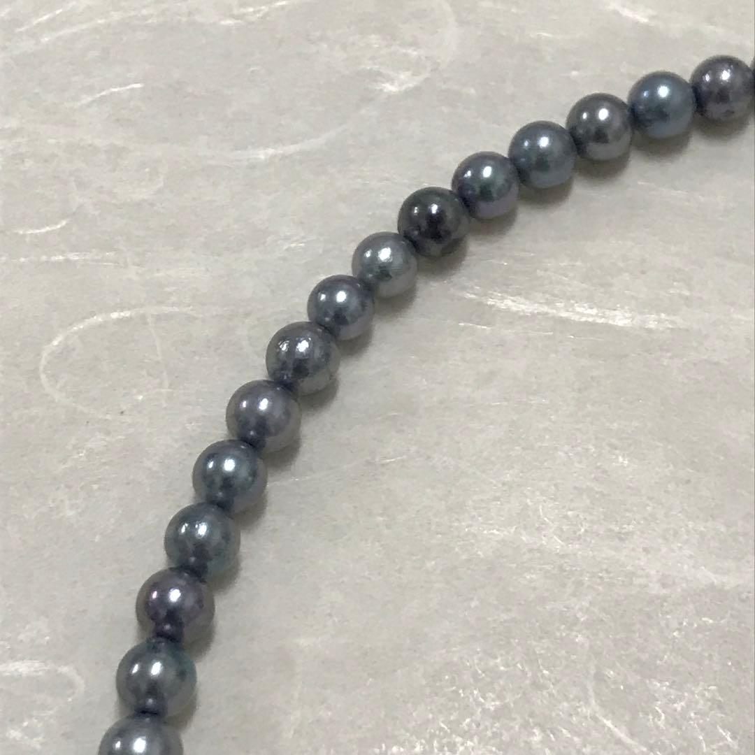 Akoya pearl necklace with small round blue-grey pearls on a 40cm strand with sterling silver clasp