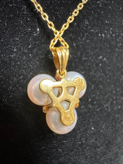 MIKIMOTO necklace with three Akoya pearls and one diamond set in 18K yellow gold with 38cm chain