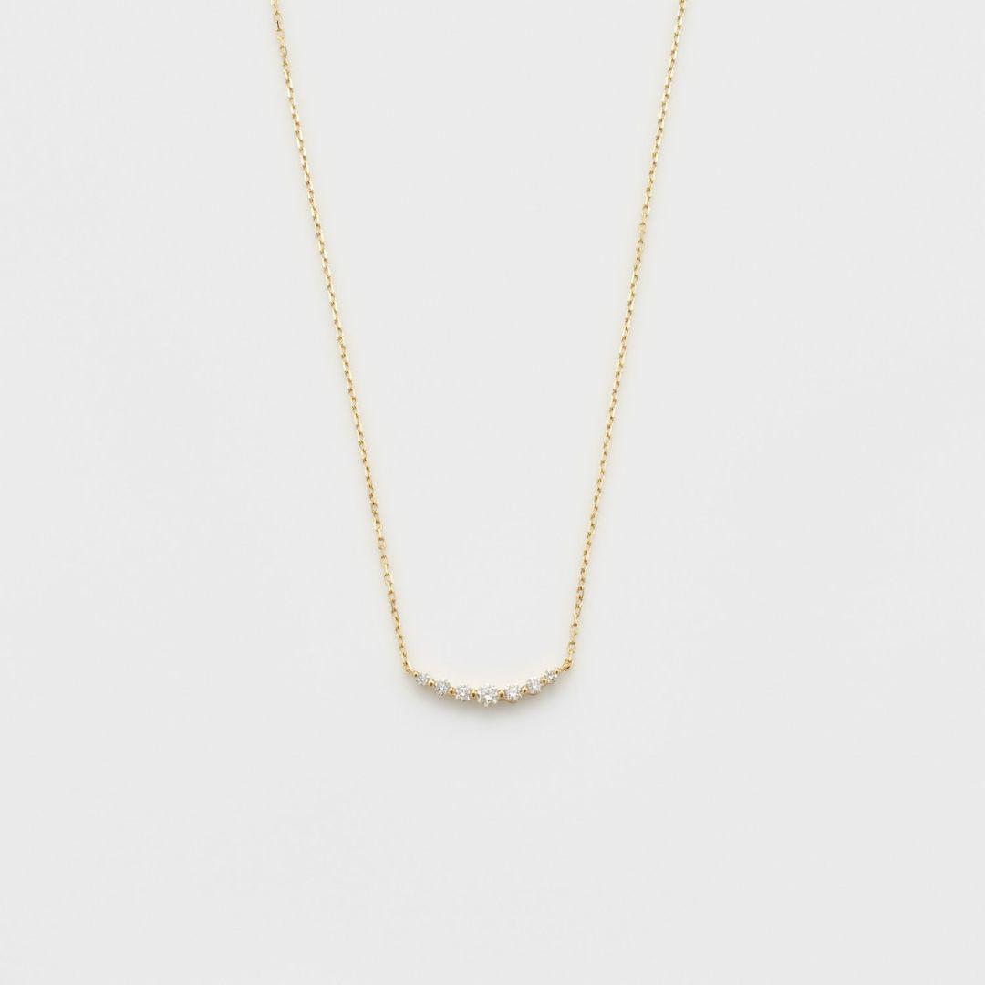 agete K18 gold necklace featuring a delicate chain with sparkling diamond pendant
