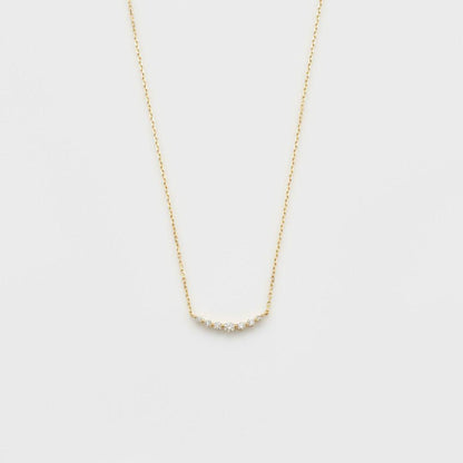 agete K18 gold necklace featuring a delicate chain with sparkling diamond pendant