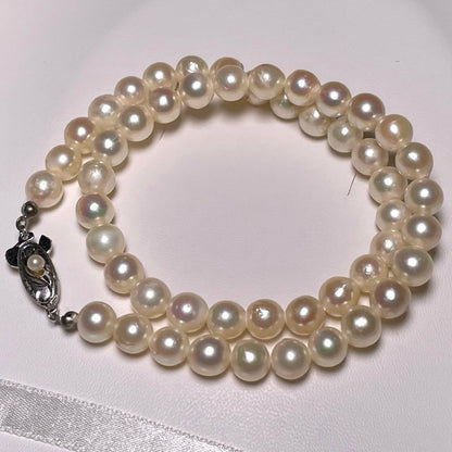 Akoya pearl semi-baroque necklace 7.0-7.4mm white pearls on silver chain length 39.1 cm