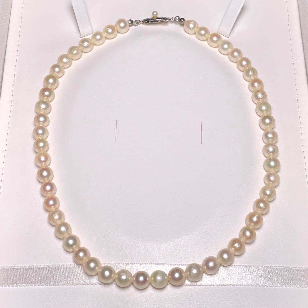 Akoya pearl semi-baroque necklace 7.0-7.4mm white pearls on silver chain length 39.1 cm