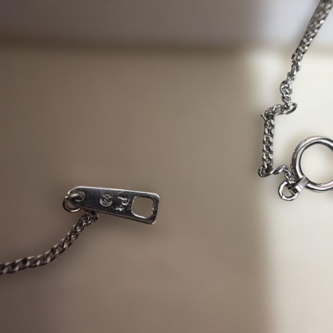 TASAKI pearl necklace with 8.1mm white pearl and 0.11ct diamond pendant on a fine chain