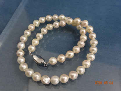 Akoya pearl necklace featuring 8-8.5mm baroque pearls on a 43cm strand with one-touch silver clasp
