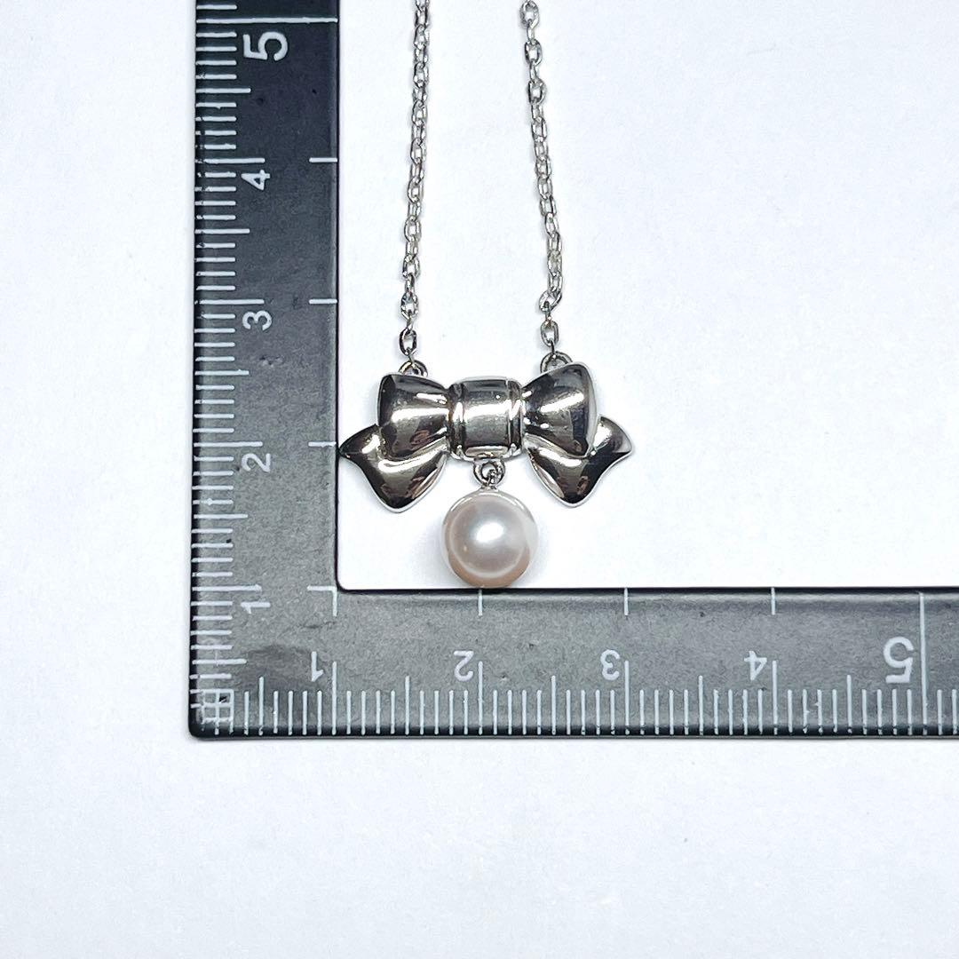 Mikimoto Akoya pearl necklace with 6.7mm pearls and silver ribbon motif pendant on 38.5cm chain