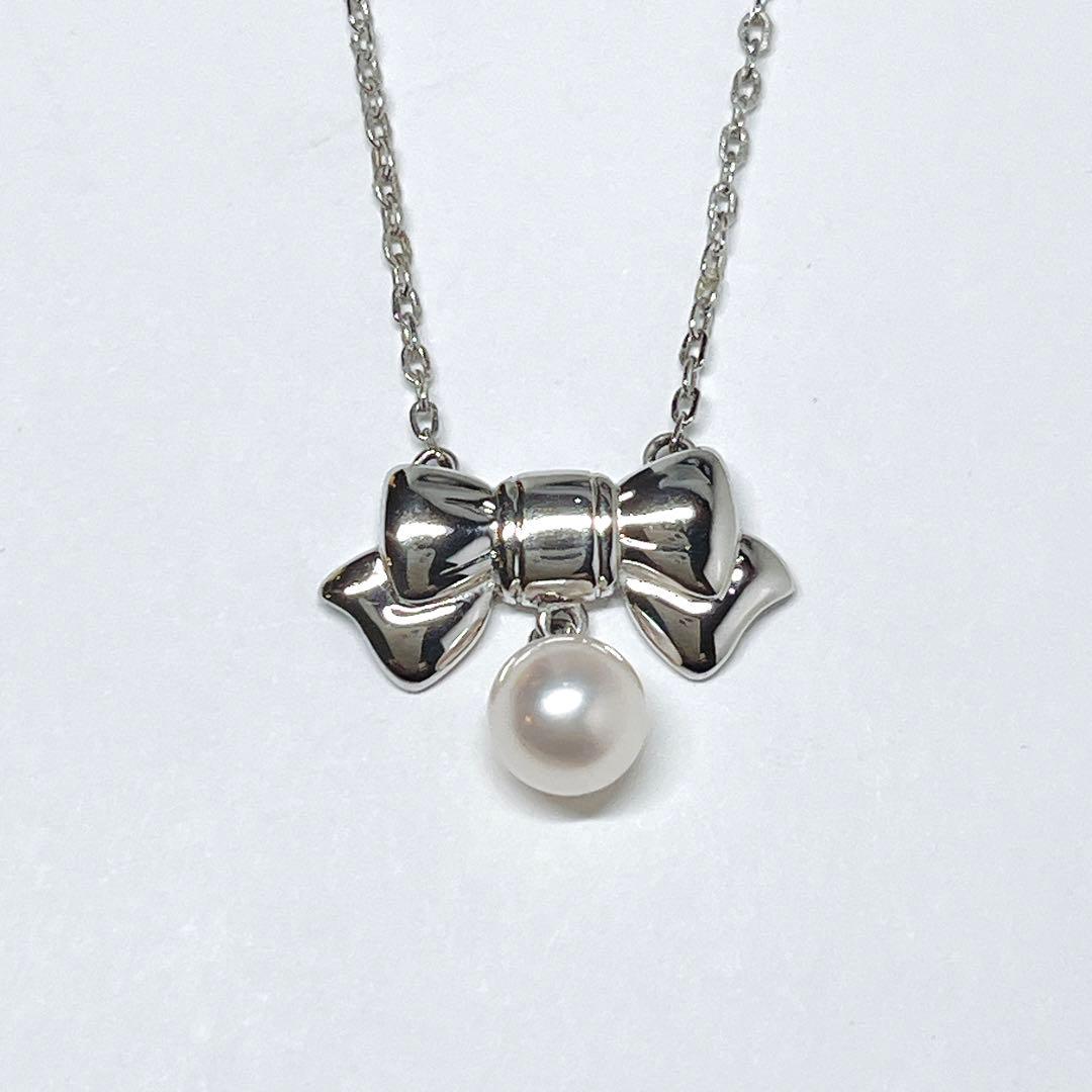 Mikimoto Akoya pearl necklace with 6.7mm pearls and silver ribbon motif pendant on 38.5cm chain
