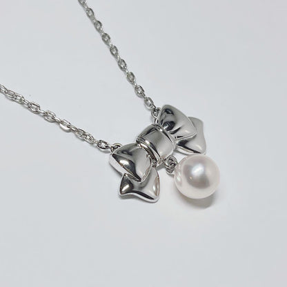 Mikimoto Akoya pearl necklace with 6.7mm pearls and silver ribbon motif pendant on 38.5cm chain