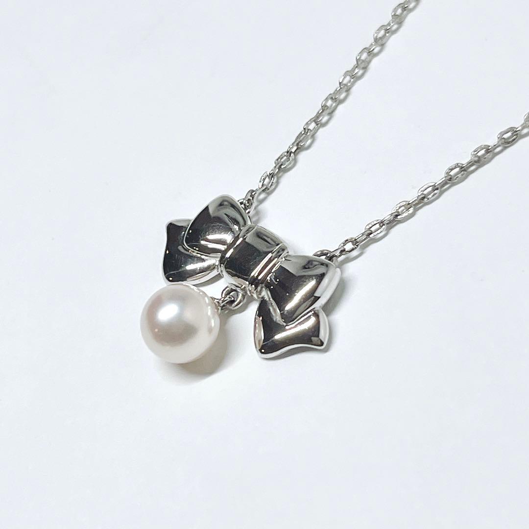 Mikimoto Akoya pearl necklace with 6.7mm pearls and silver ribbon motif pendant on 38.5cm chain