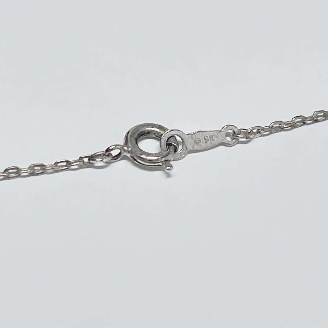 Mikimoto Akoya pearl necklace with 6.7mm pearls and silver ribbon motif pendant on 38.5cm chain