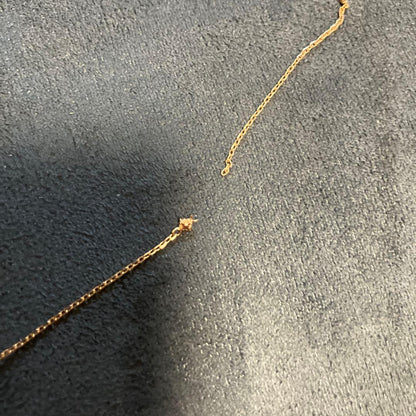 agete pendant necklace in 10k gold with diamond center stone and broken chain