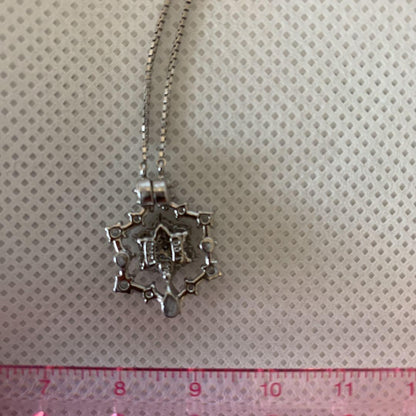 TASAKI pearl and diamond platinum necklace featuring 1 carat diamonds and double-sided magnetic design