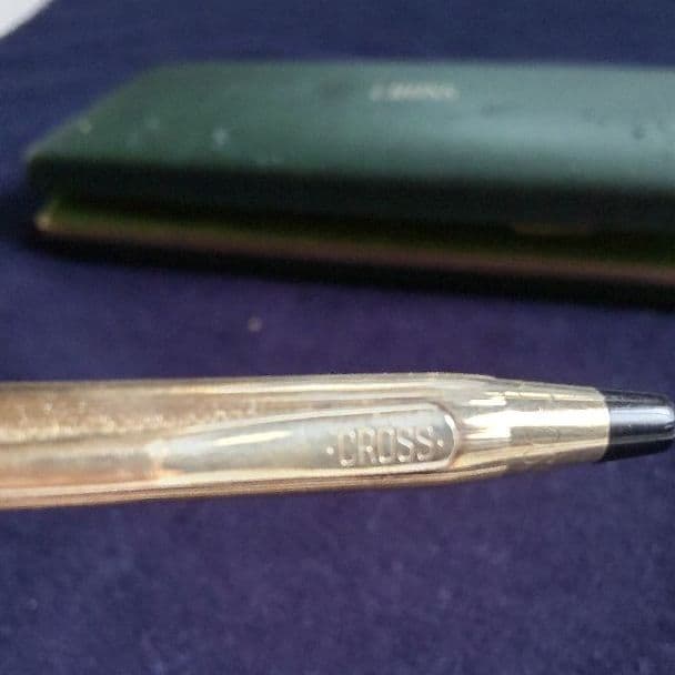 Cross ballpoint pen with 10K gold plating and black ink, measuring 13 cm long
