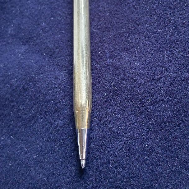 Cross ballpoint pen with 10K gold plating and black ink, measuring 13 cm long