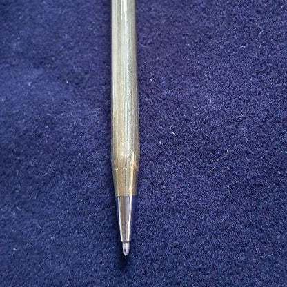 Cross ballpoint pen with 10K gold plating and black ink, measuring 13 cm long