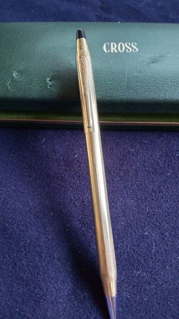 Cross ballpoint pen with 10K gold plating and black ink, measuring 13 cm long