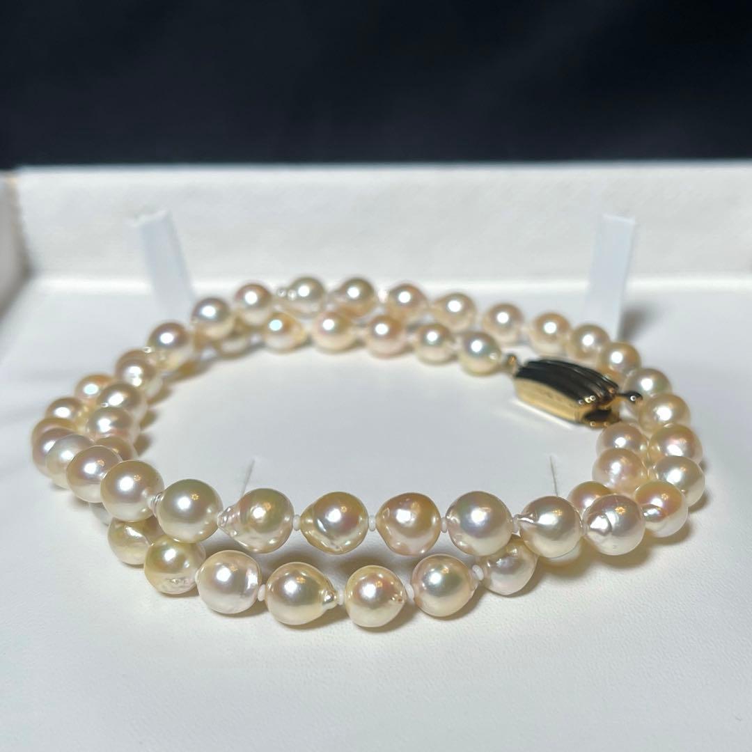 Akoya pearl semi-long necklace with round 6.6-7.0mm white pearls and silver coil clasp, 46cm length
