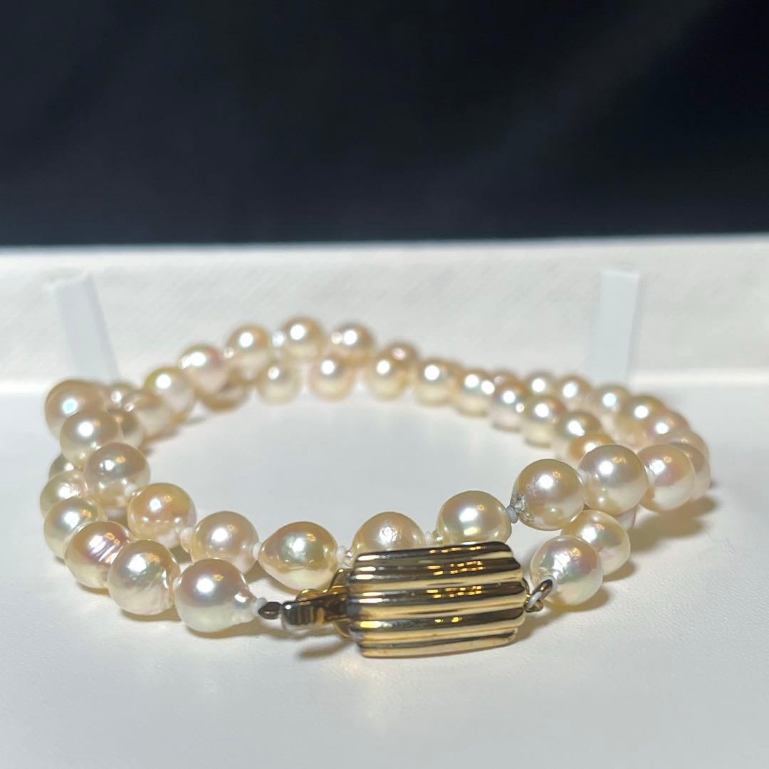 Akoya pearl semi-long necklace with round 6.6-7.0mm white pearls and silver coil clasp, 46cm length