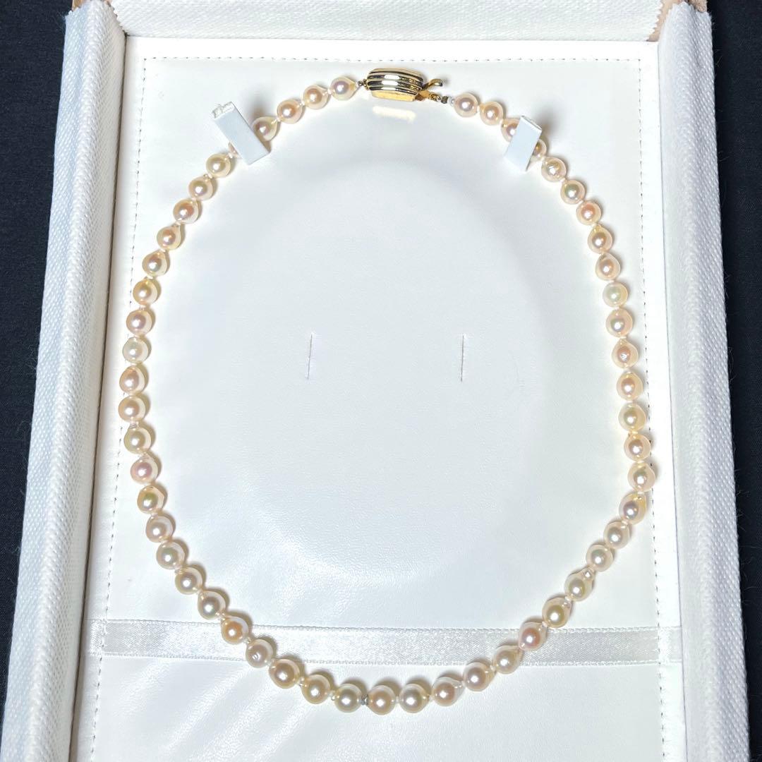 Akoya pearl semi-long necklace with round 6.6-7.0mm white pearls and silver coil clasp, 46cm length