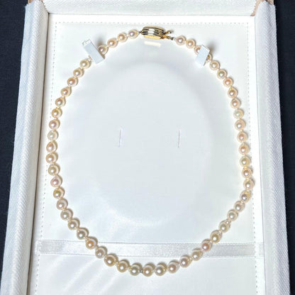 Akoya pearl semi-long necklace with round 6.6-7.0mm white pearls and silver coil clasp, 46cm length