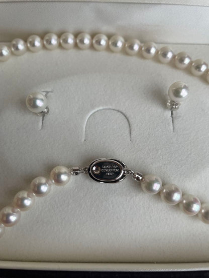 Akoya Pearl Aurora Hanadama necklace with 7.7mm pearls and matching 14k white gold earrings