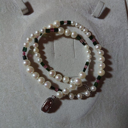 Akoya Baby Pearl and Natural Tourmaline Necklace 65 measuring 44.5 cm with pearls 4-6 mm and tourmaline stones