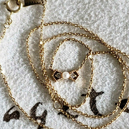 Ribbon Diamond Pearl Necklace featuring two diamonds and one pearl on an adjustable 40 cm K10 gold chain