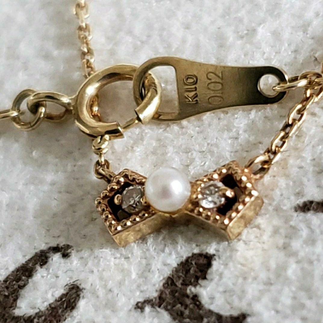 Ribbon Diamond Pearl Necklace featuring two diamonds and one pearl on an adjustable 40 cm K10 gold chain