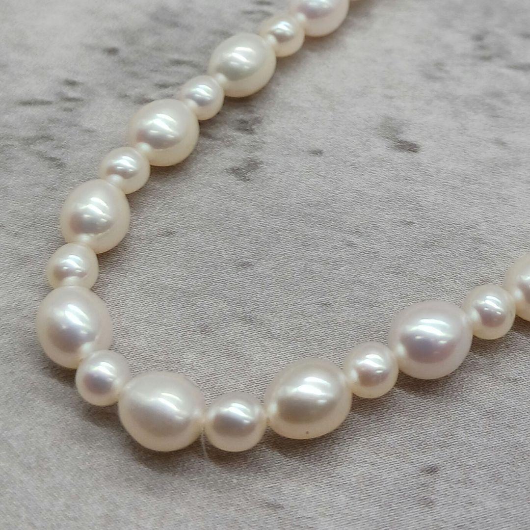 Tasaki Law Pearl Necklace featuring lustrous pearls on a 42cm chain weighing 13.8 grams
