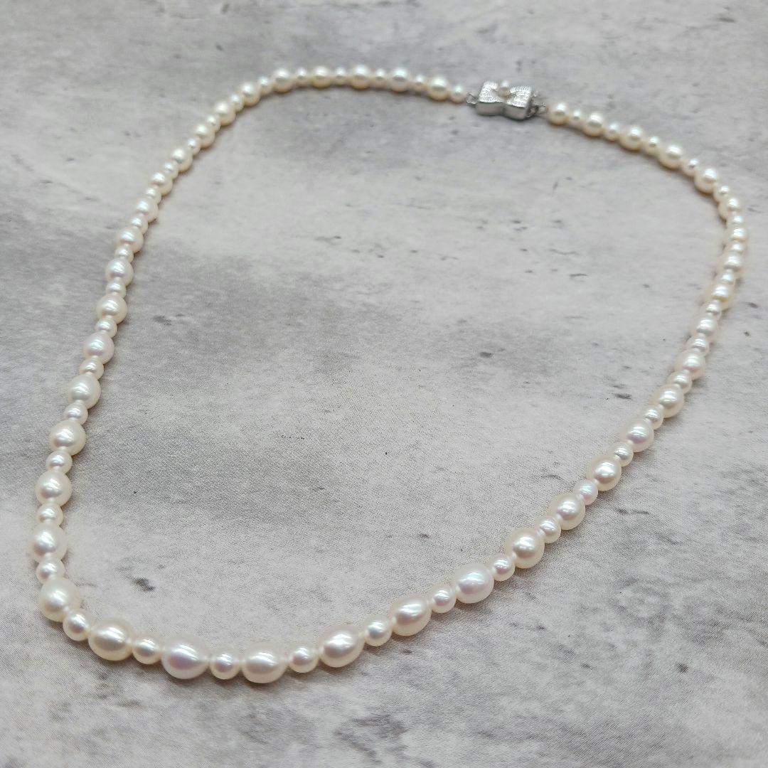 Tasaki Law Pearl Necklace featuring lustrous pearls on a 42cm chain weighing 13.8 grams