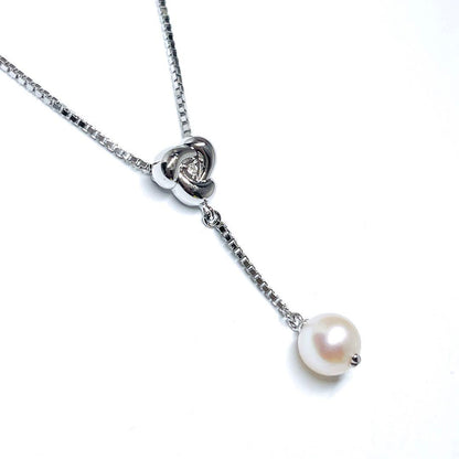 Tasaki pearl diamond necklace featuring a 6.9mm pearl and silver chain 42cm long