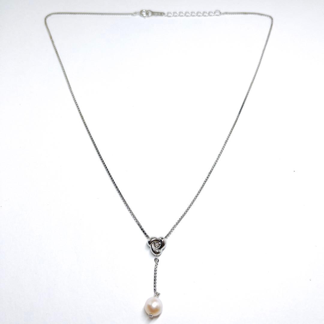 Tasaki pearl diamond necklace featuring a 6.9mm pearl and silver chain 42cm long