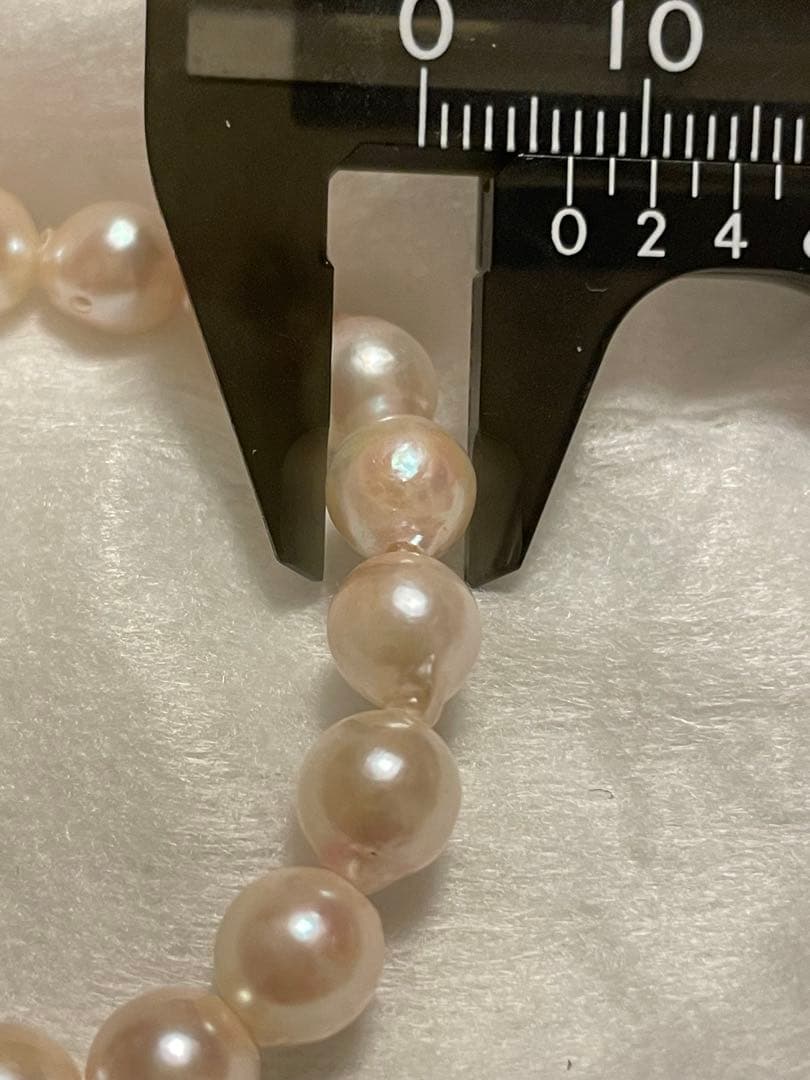 Akoya white semi-baroque pearl necklace with approximately 7mm pearls, 42cm length