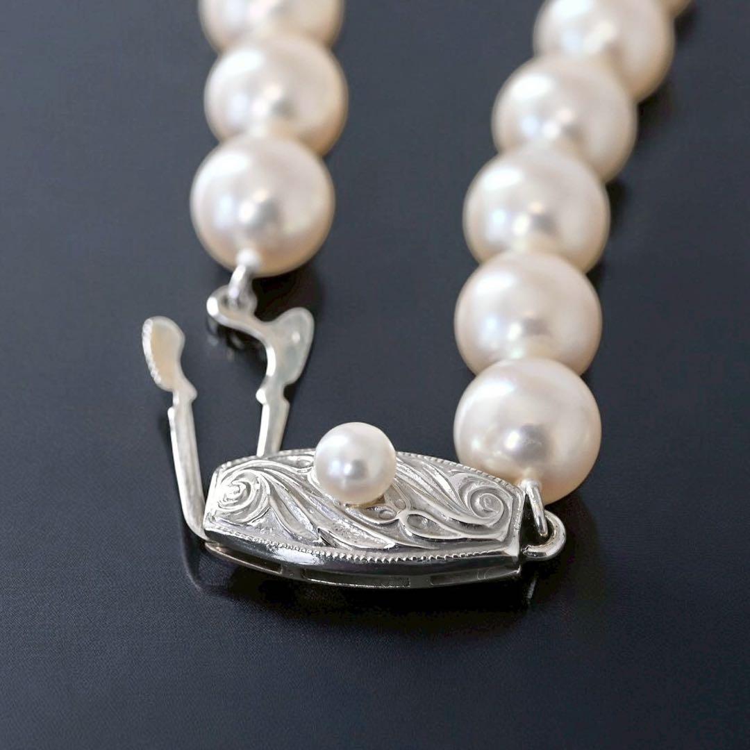 Highest grade Tasaki K14 white gold necklace with round Akoya pearls and a 42.5 cm length