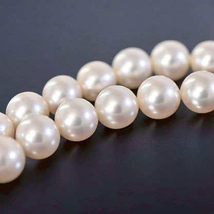 Highest grade Tasaki K14 white gold necklace with round Akoya pearls and a 42.5 cm length