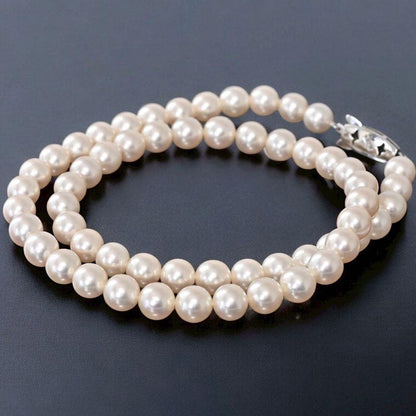 Highest grade Tasaki K14 white gold necklace with round Akoya pearls and a 42.5 cm length